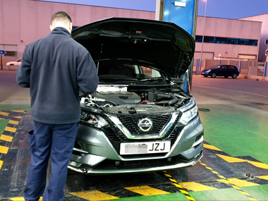Nissan Qashqai is inspected during early morning import test in Murcia Nissan Qashqai with ITV technician
